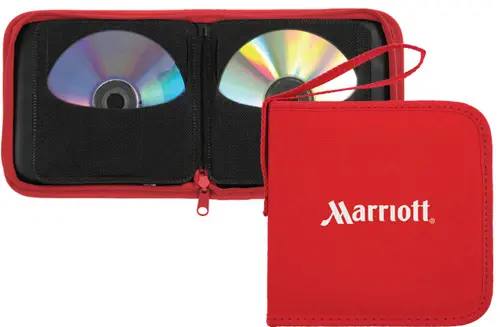 A red case with two discs inside of it.