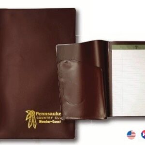 A brown folder with a gold logo and a note pad.