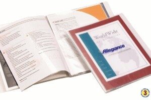 A book with an open cover and two other books