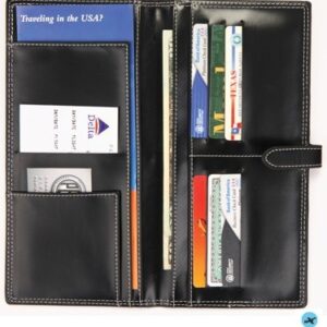 A black leather wallet with multiple cards and money.