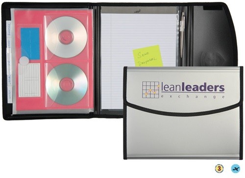 A binder with two cds and some notes