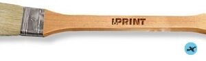 A wooden spoon with the word " prime ".