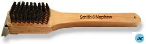 A wooden spoon with the name smith and co. Written on it