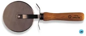 A wooden handle is on the side of a pan.