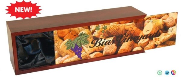 A wooden box with wine and bread on it.