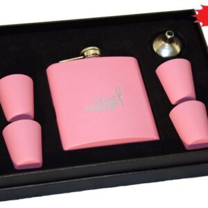 A pink flask and four shot glasses in a box.