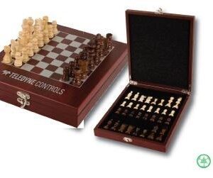 A wooden chess set with pieces in the box.