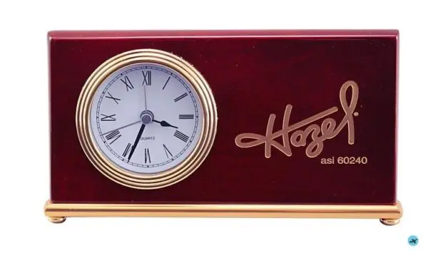 A clock with the name of hozeley and company.