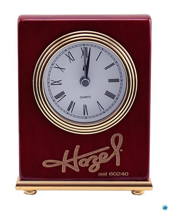 A clock is shown with the name of hozel and year.