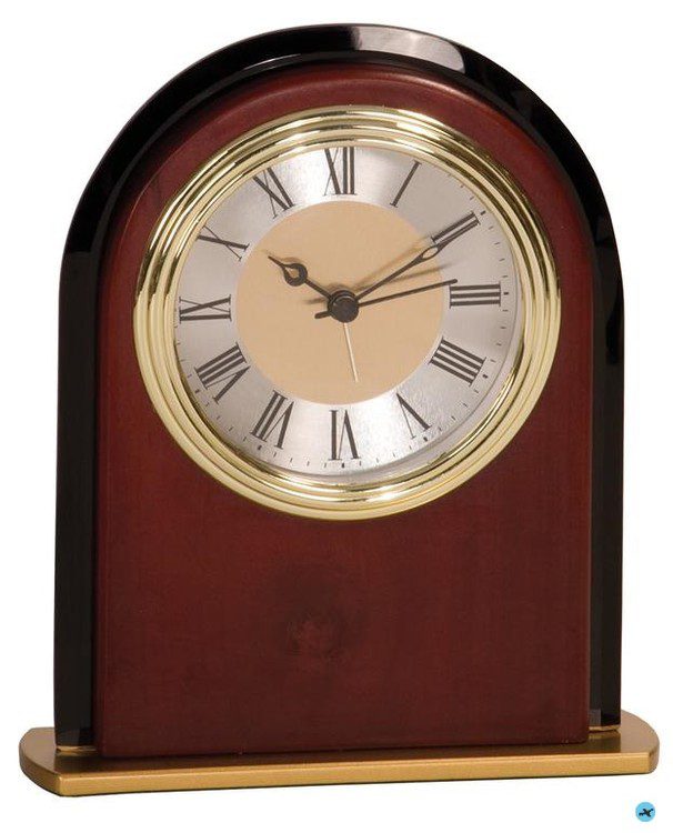 A clock that is on top of a table.