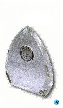 A crystal clock is shown with the words " time stands still ".