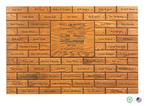 A brick wall with many names on it