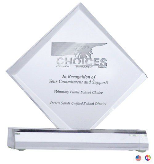 A diamond shaped award with the word " choices " on it.