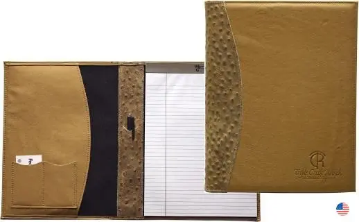 A brown and black folder with a pen on it