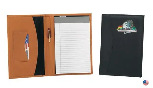 A note pad and pen are shown in front of a folder.