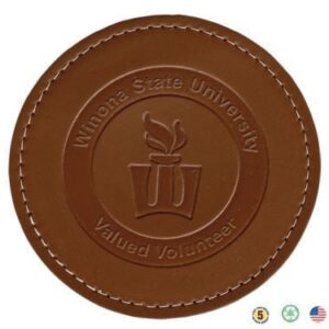 A brown leather coaster with the words wilkes state university and villanova university.
