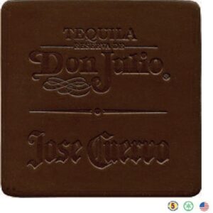 A square shaped chocolate bar with the words " tequila don julio jose cuervo ".