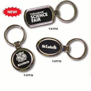 A group of three key chains that are different designs.