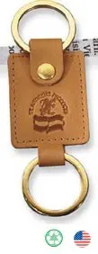 A brown leather key chain with a gold ring.