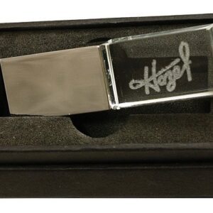 A metal and glass money clip in its box.