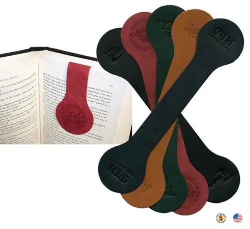 A book with a red bookmark and several other colored bookmarks