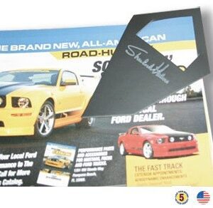 A poster of a yellow car and a black car.