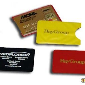 A group of different business cards and a card holder.