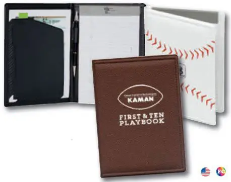 A baseball themed first and ten playbook with pens, notepad, and pen.