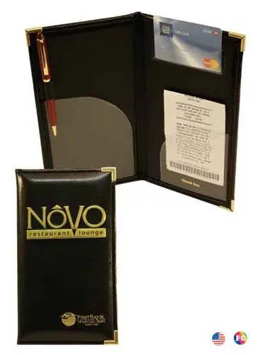 A black folder with gold lettering and a pencil