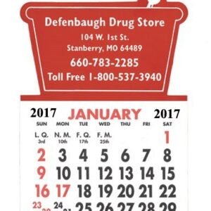 A red calendar with the words " defenbaugh drug store " on it.